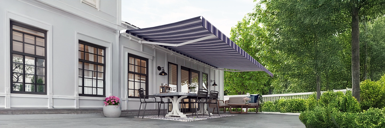 Gray and white striped awning on a white house