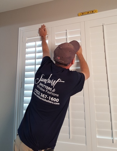 Shutter installation in Las Vegas bedroom.